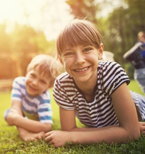 smiling-kids-lawn